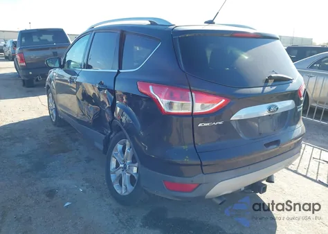 2015 Ford Escape Titanium z USA, uszkodzony, nr VIN 1FMCU0JX9FUC66062